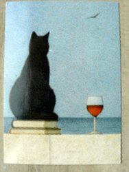 postcard shows a cat by the sea