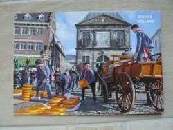 postcard Gouda cheese market in city Gouda Netherlands