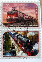 train postage stamps electric locomotive and a steam locomotive