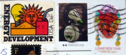three U.S. stamps on postcard no 212