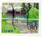 Japan postage stamp steam locomotive on a bridge